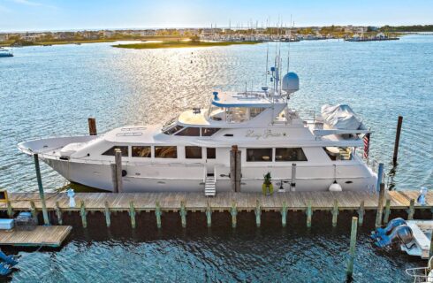 White yacht named Lady Grace docked in a marina